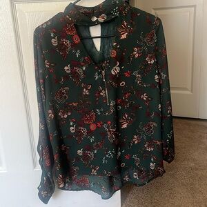 Woman’s Fashion Top - Used but still in pretty good condition.